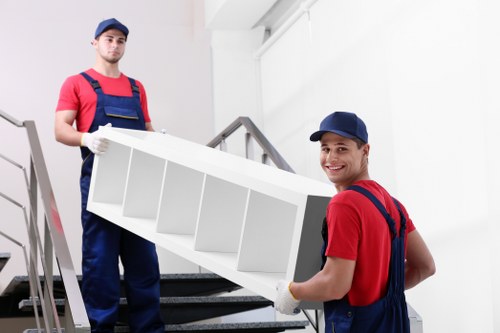 Office relocation planning in Bermondsey with moving boxes and desks