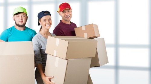 Moving team outside a Bermondsey flat preparing for a local house move