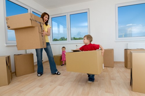 Packed office furniture and equipment ready for relocation in Bermondsey