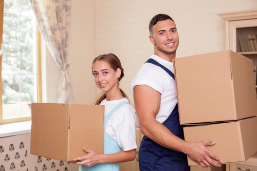 Professional movers handling furniture in Bermondsey
