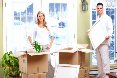Packed boxes and household items prepared for removal van transport